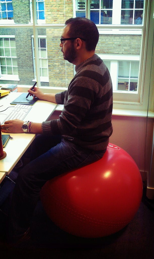 Stability ball and low back pain in office workers